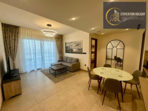 Stylish 1BR Lavish Living Waves Grande